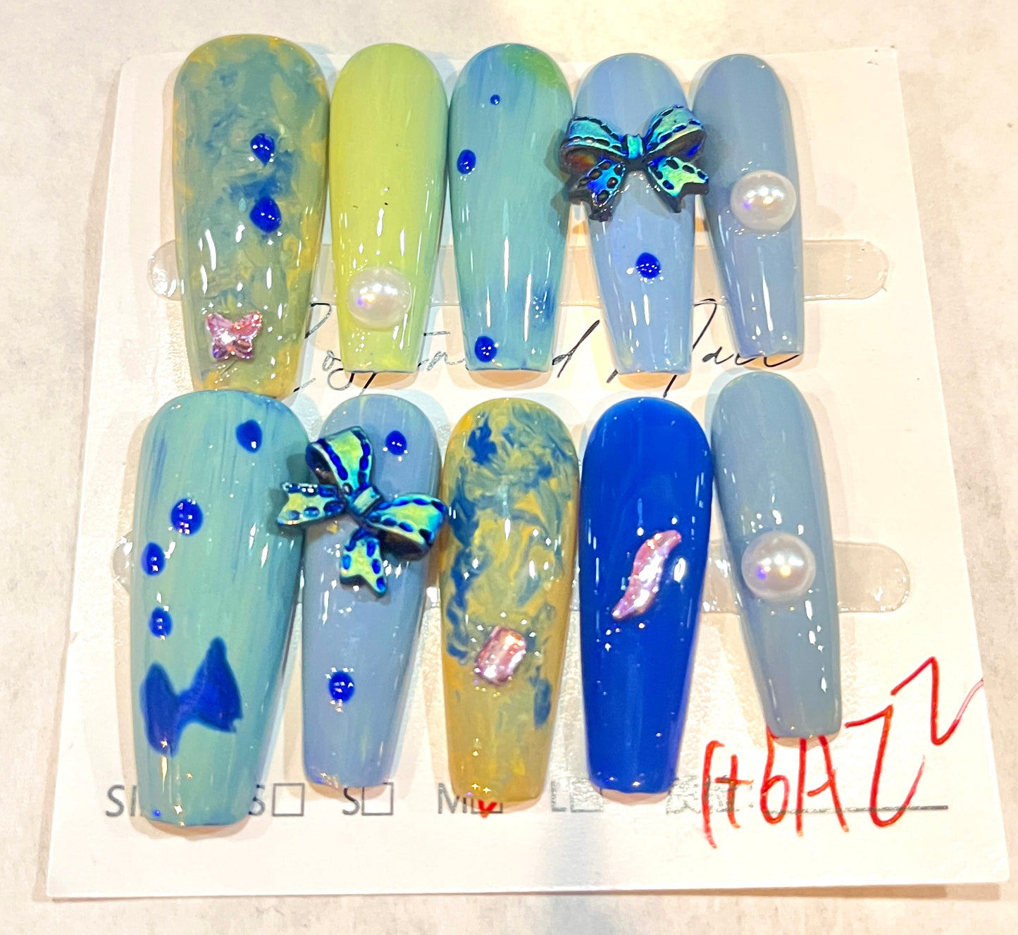 Ocean Mirage – Abstract Blue & Lime Press-On Nails with Butterflies & Pearls