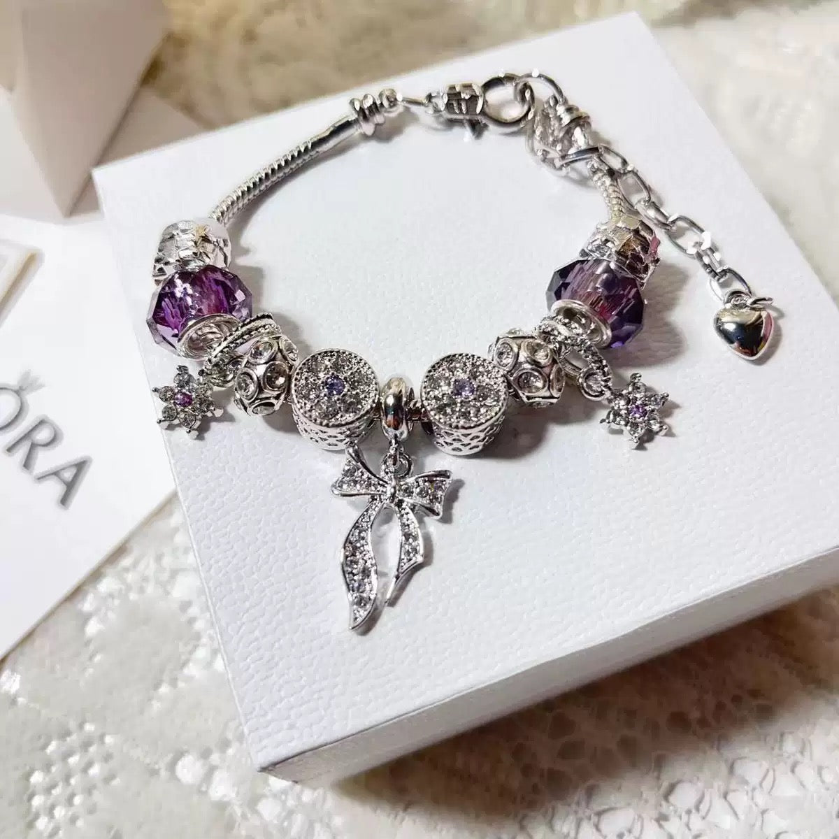 Purple Charm Bracelet – Crystal Bow & Star Beads