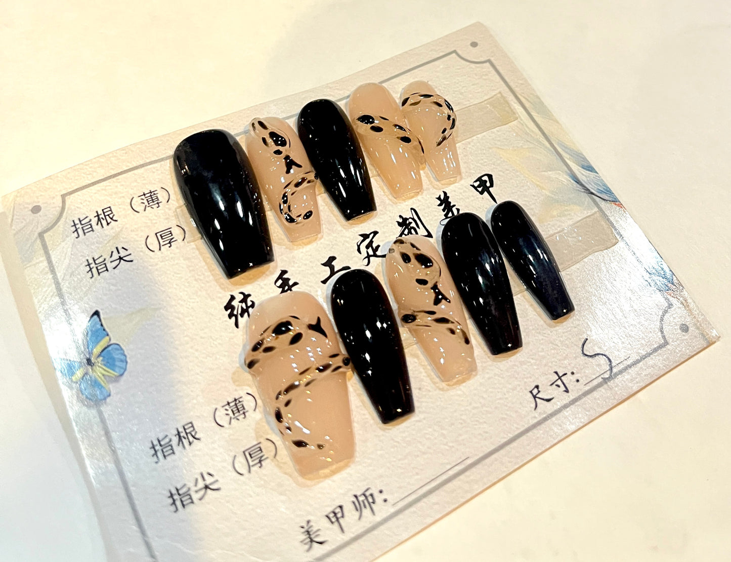Black Ink Swirl Nude Press-On Nails – S Size