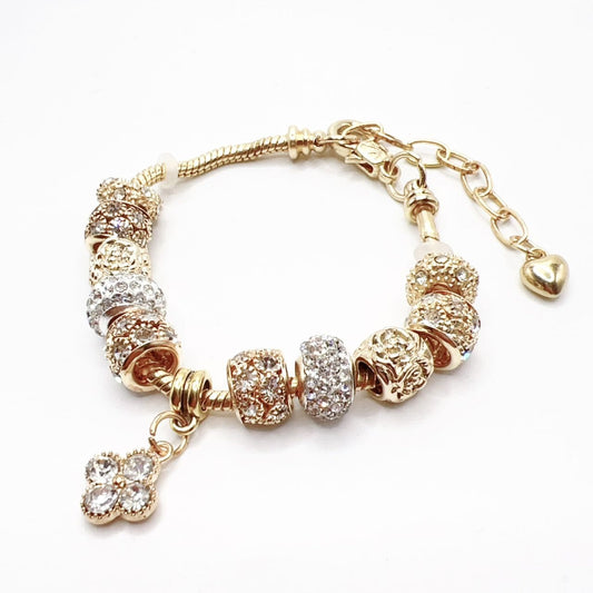 Gold Crystal Charm Bracelet – Elegant Flower Drop Design