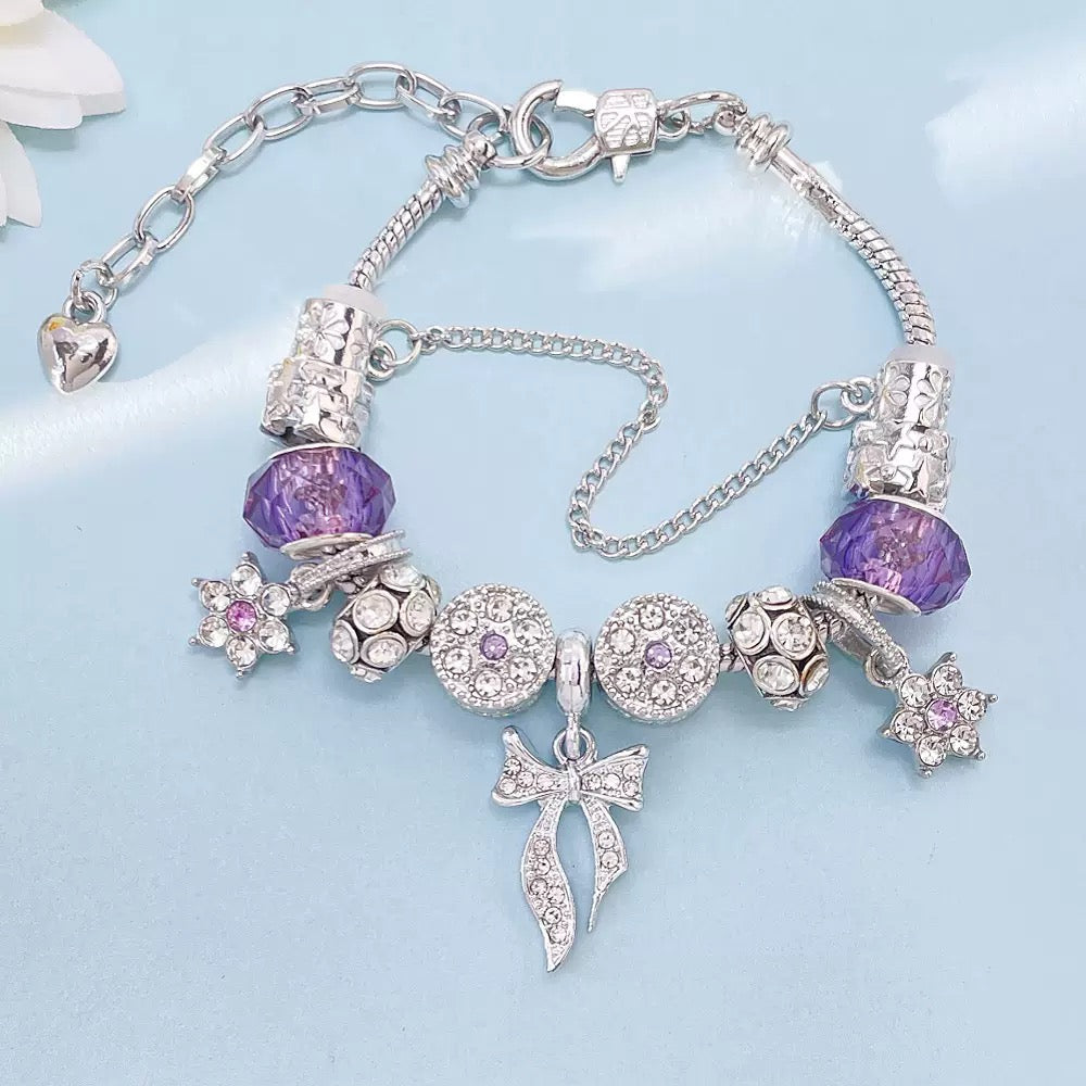 Purple Charm Bracelet – Crystal Bow & Star Beads
