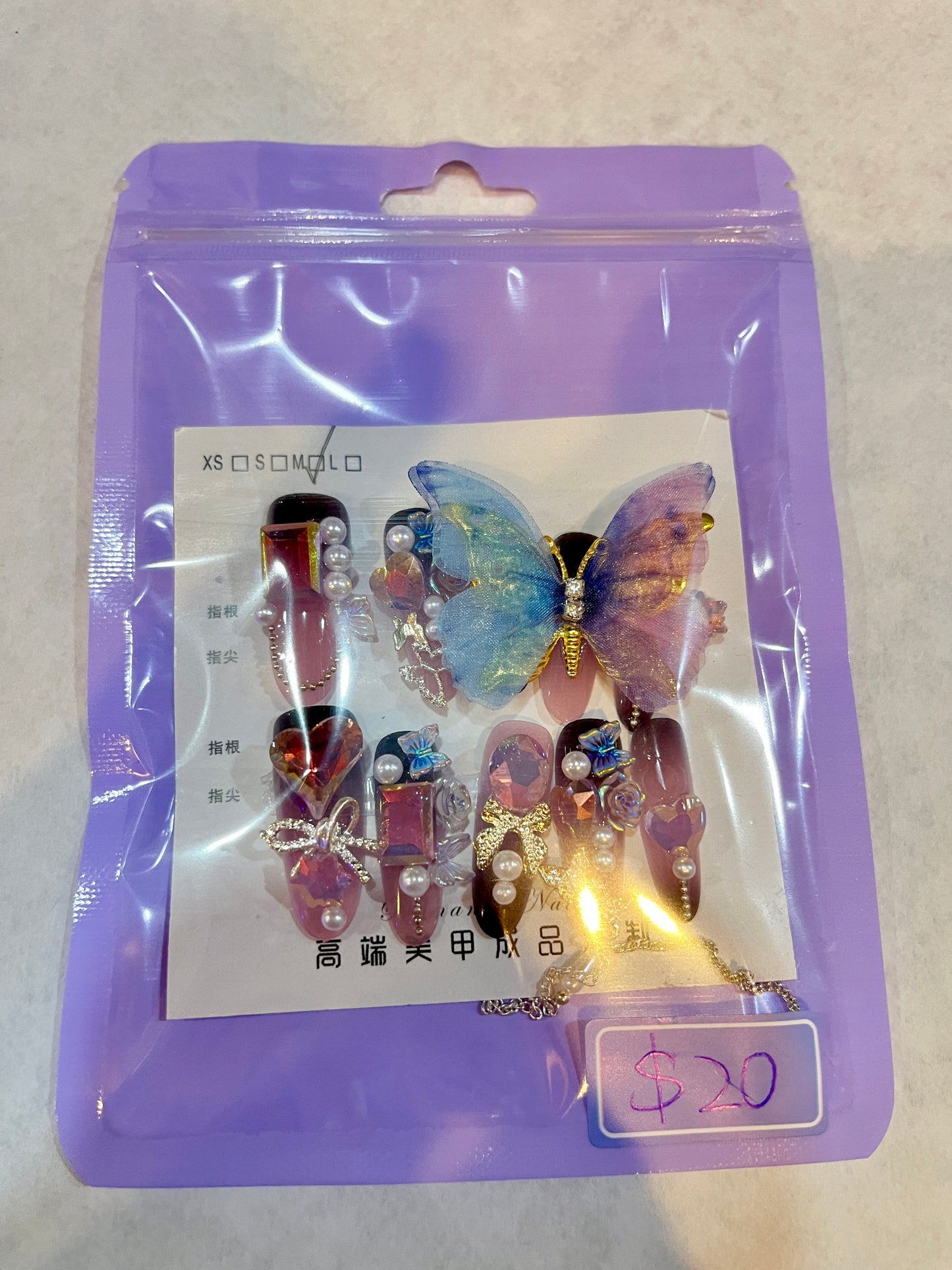 unique design with butterfly charm press-on nail